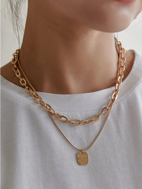 Collier superposé géométrique or jaune