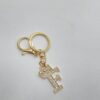 Porte-clés lettre et couronne en strass