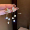 boucles d'oreilles papillon en strass