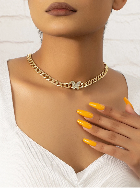 Collier papillon en strass doré