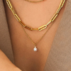 Collier multicouche avec pendentif en fausses perles