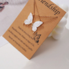 Ensemble de 2 colliers papillon