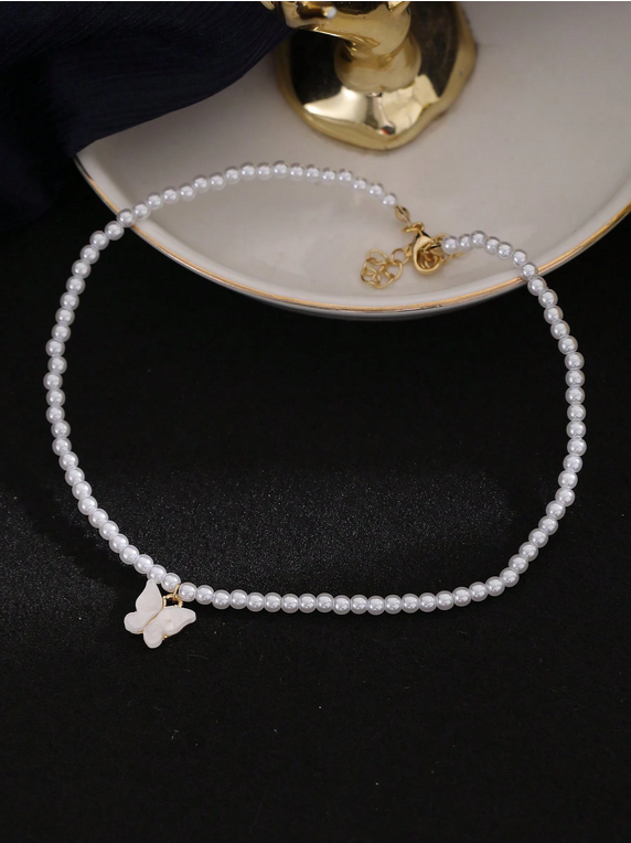 Collier papillon perlé
