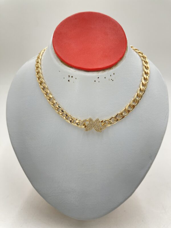 Collier papillon en strass doré
